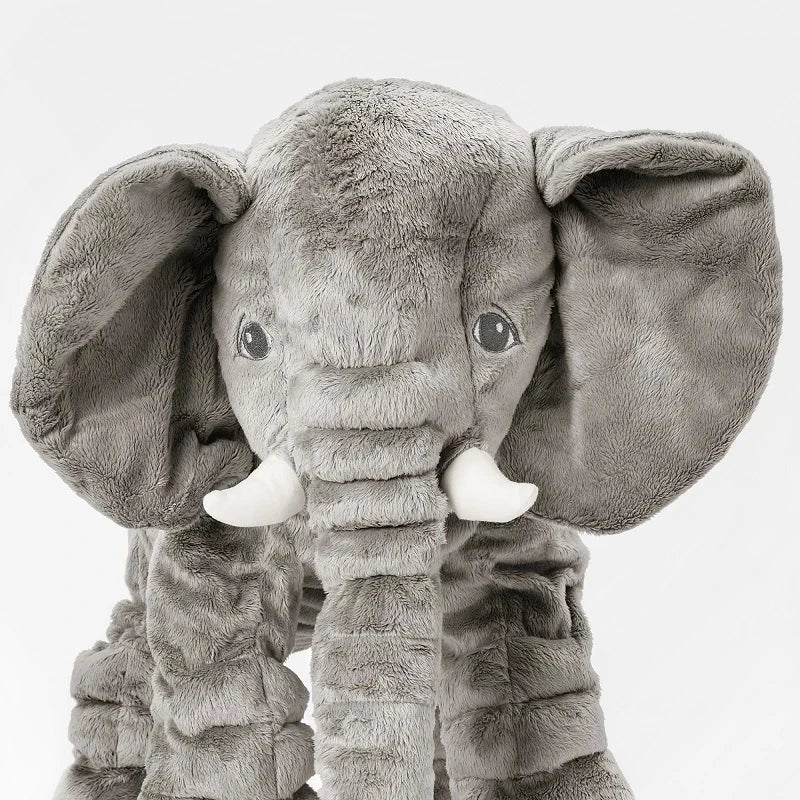 Front view of a soft elephant toy for babies with stitched details