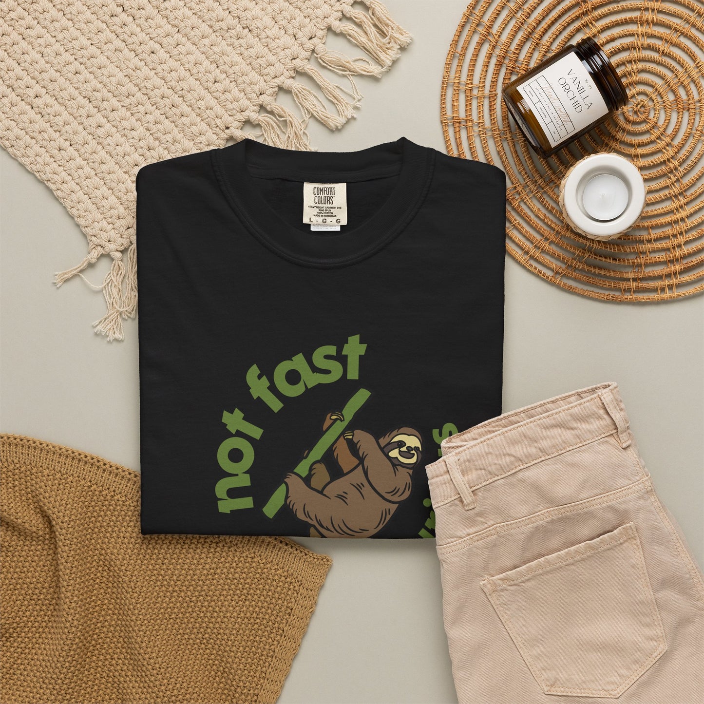 Funny sloth graphic tee gift wrapped for birthday presented on neutral background