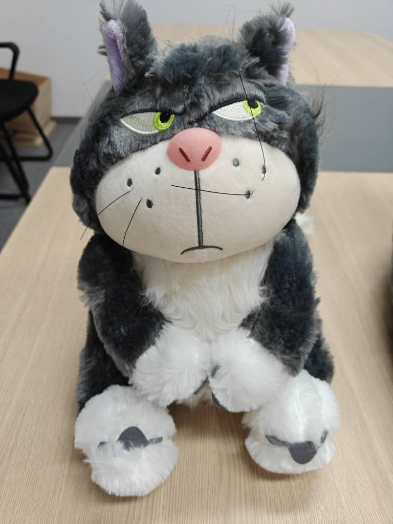 Judgmental cat plush supplier update