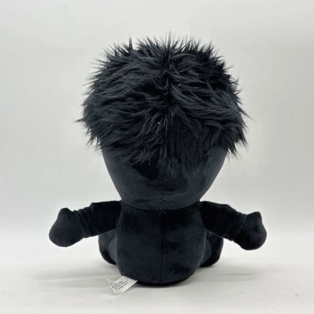 N stuffed toy displayed on shelf horror collectible
