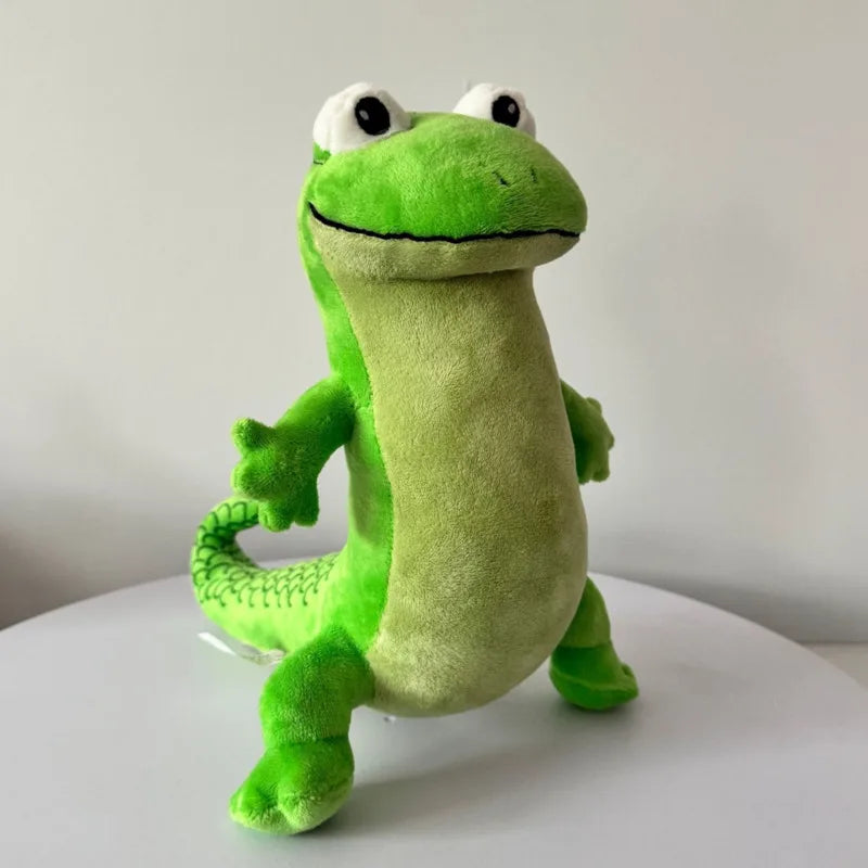 tom lizard plush toy in a play room setting