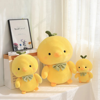 35cm squishy chick plush held by two hands showing full size scale