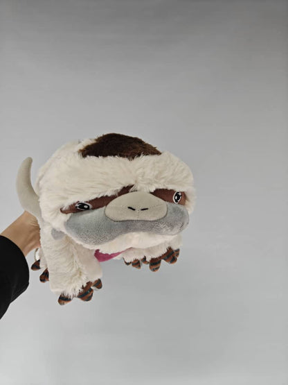 A_smiling_child_securely_holding_the_lightweight_17.7-inch_Appa_plush_gift.supplier_photo