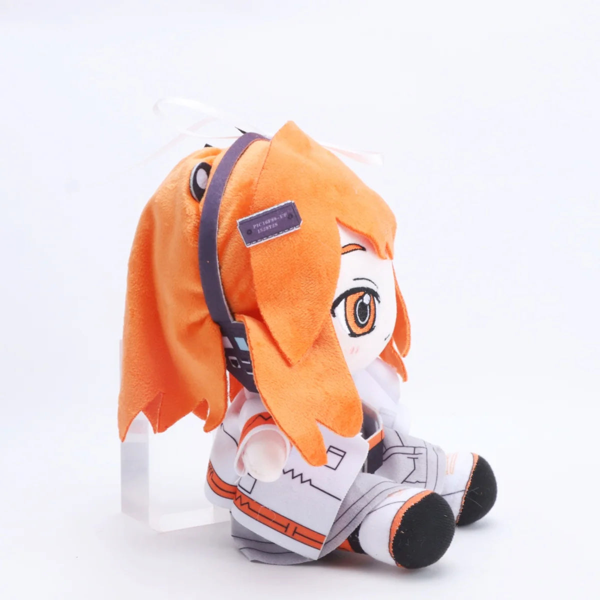 Adachi Rei handmade toy with orange accents and signature robot girl colour palette
