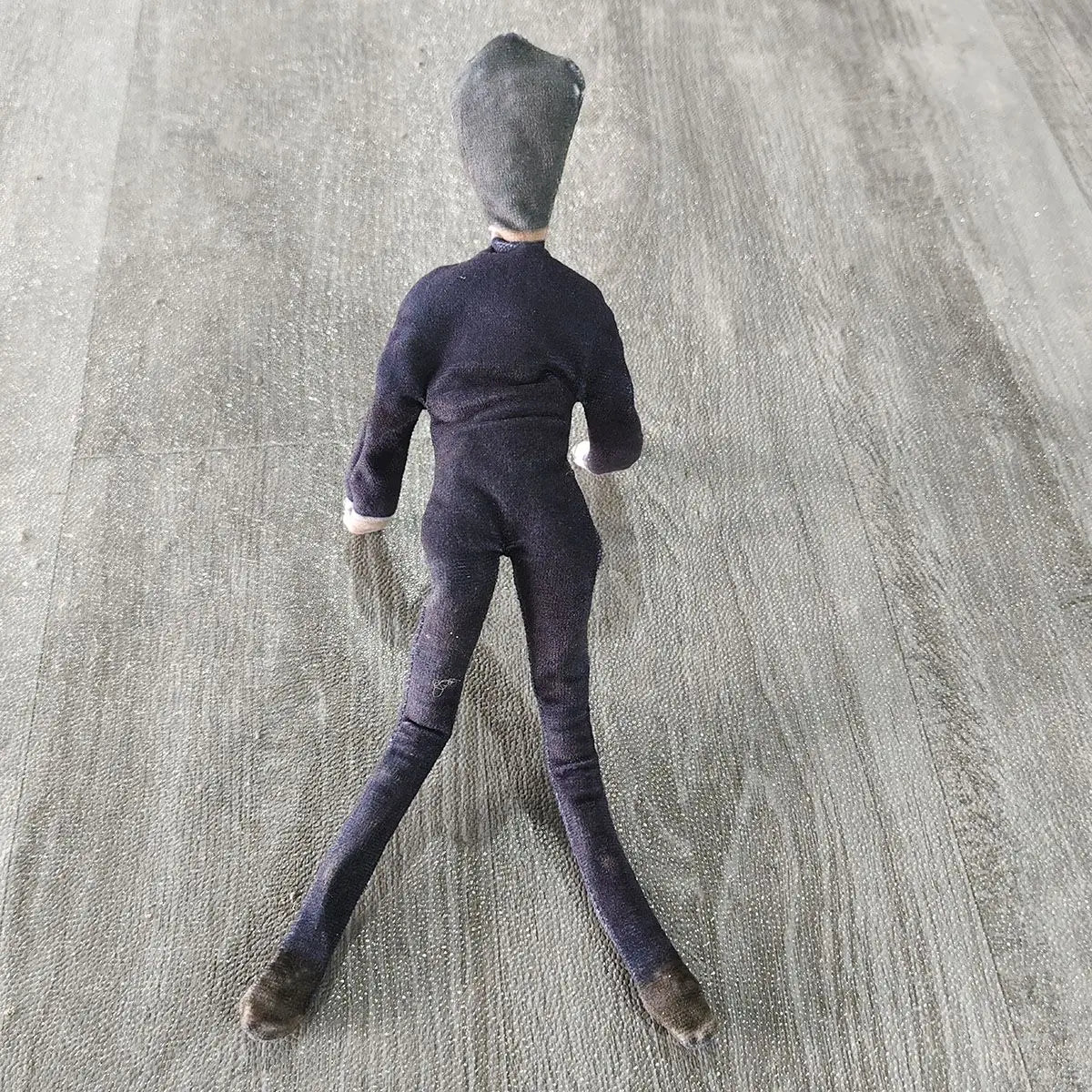 Adachi stuffed plush side profile close-up
