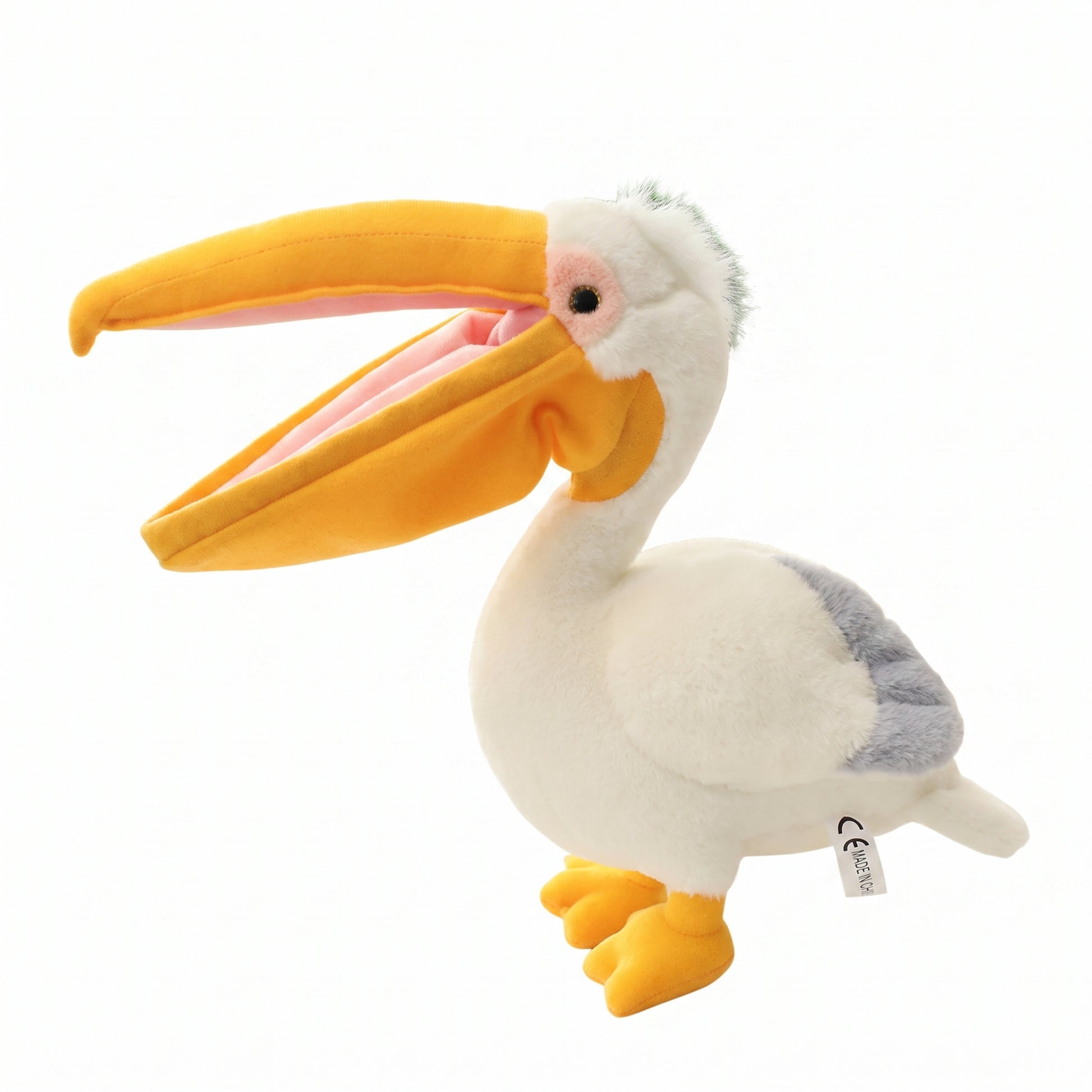 Adorably derpy pelican plush with wide open beak pouch, 30cm stuffed animal front view