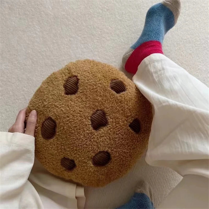 Aesthetic room decor featuring cookie plush and other kawaii items on a shelf