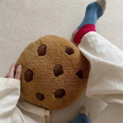 Aesthetic room decor featuring cookie plush and other kawaii items on a shelf