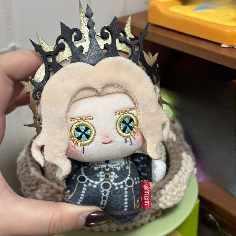 Alice DeRoss Plush doll with signature blonde braided hairstyle and bow
