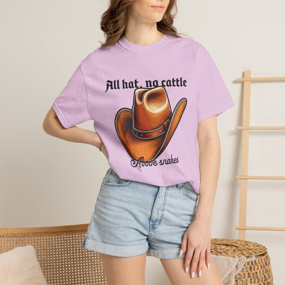 All hat non cattle tees hanging on a rustic ranch clothing rail
