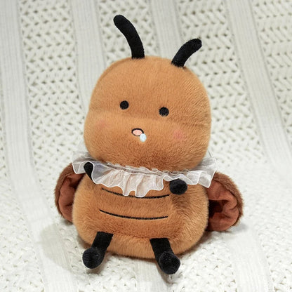 All three cockroach stuffed toy variants flat lay product photography