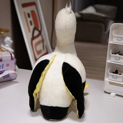 All three derpy bird plushies displayed together on a shelf as plush home decor