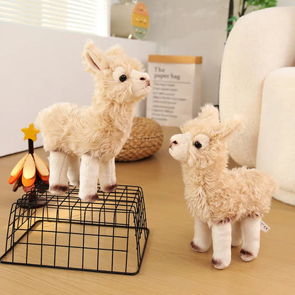 Alpaca plush collectible displayed alongside other animal plush toys
