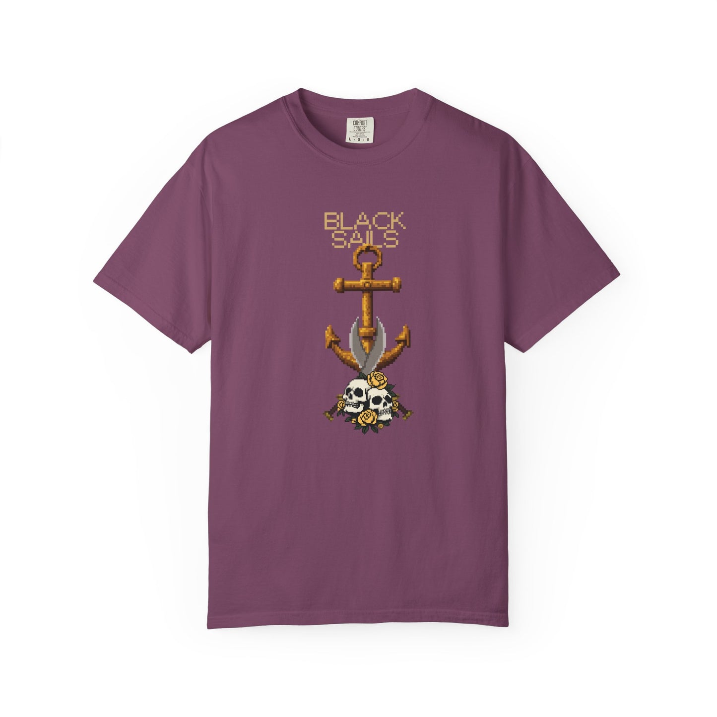 Anchor and skull graphic tee hanging on wall hook against brick background
