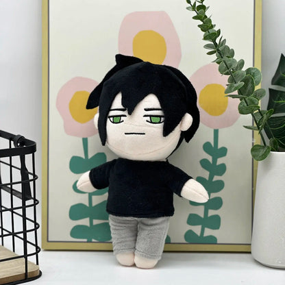 Andrew plush doll held in hand to show 27cm size
