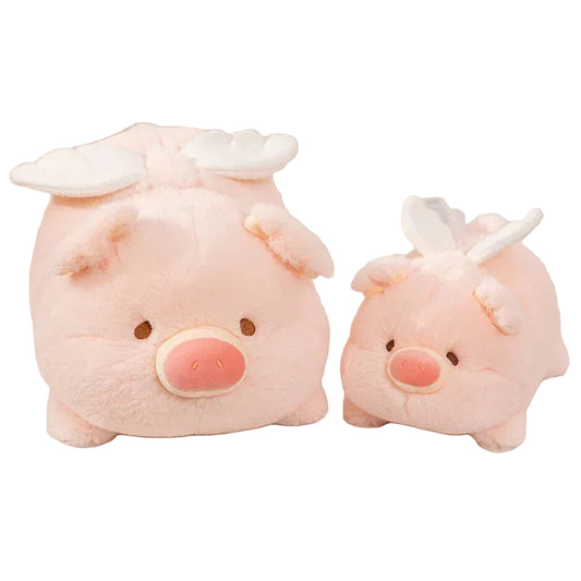 Angel pig plushie in pastel pink lying in sleeping pose with soft angel wings