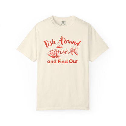 Angler wearing Fish Around and Find Out fisherman apparel tee while fishing at sunrise