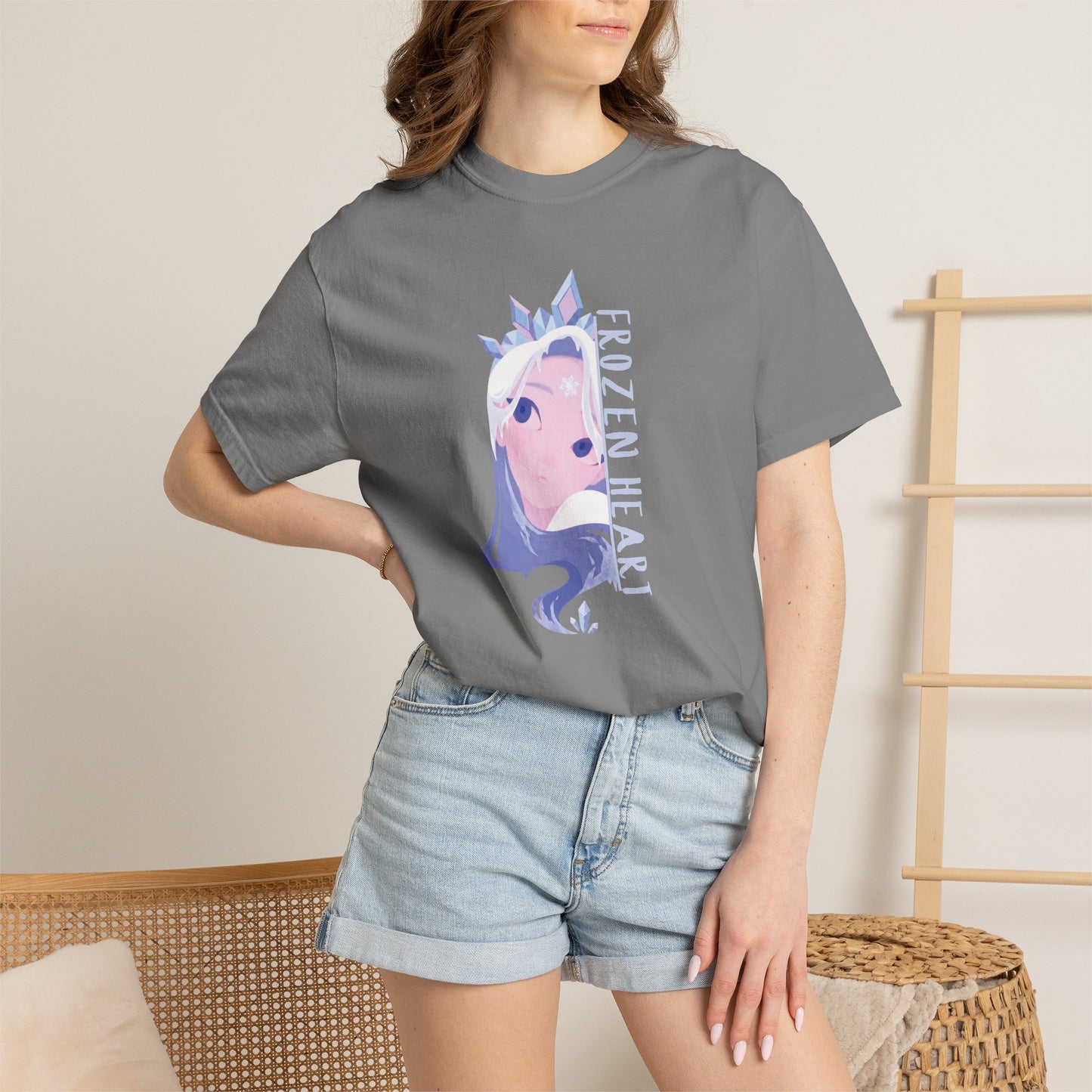 Anime aesthetic t-shirt close-up of crystal crown detail and bold frozen heart lettering
