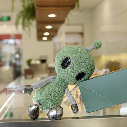Anime alien collectible plush with shiny oversized eyes front view