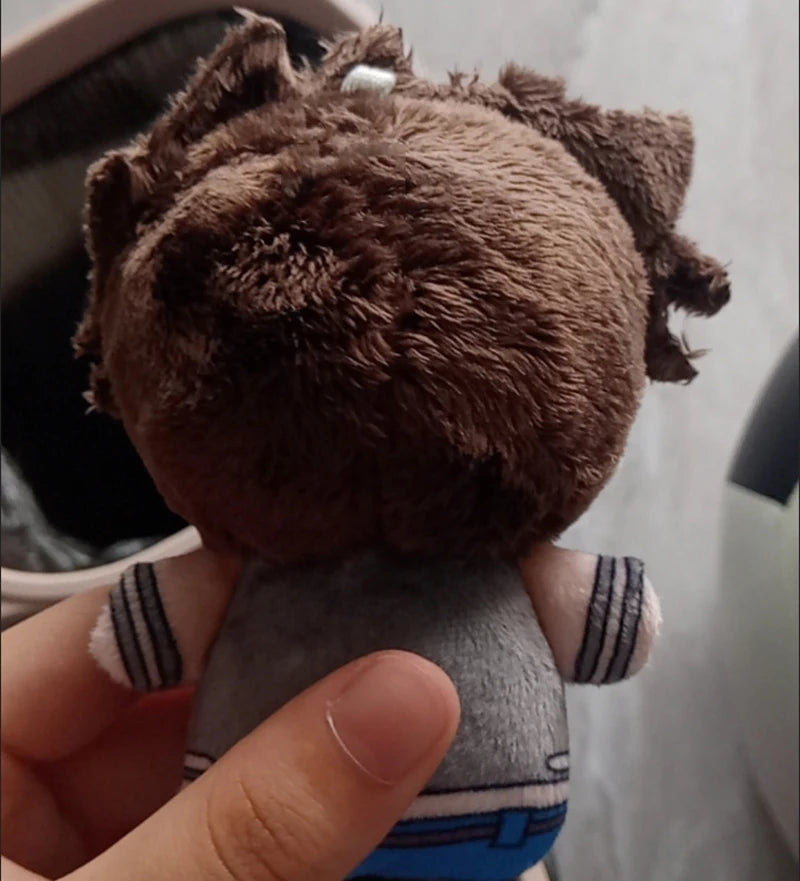 Anime chibigurumi Joseph Joestar plush sitting on display shelf
