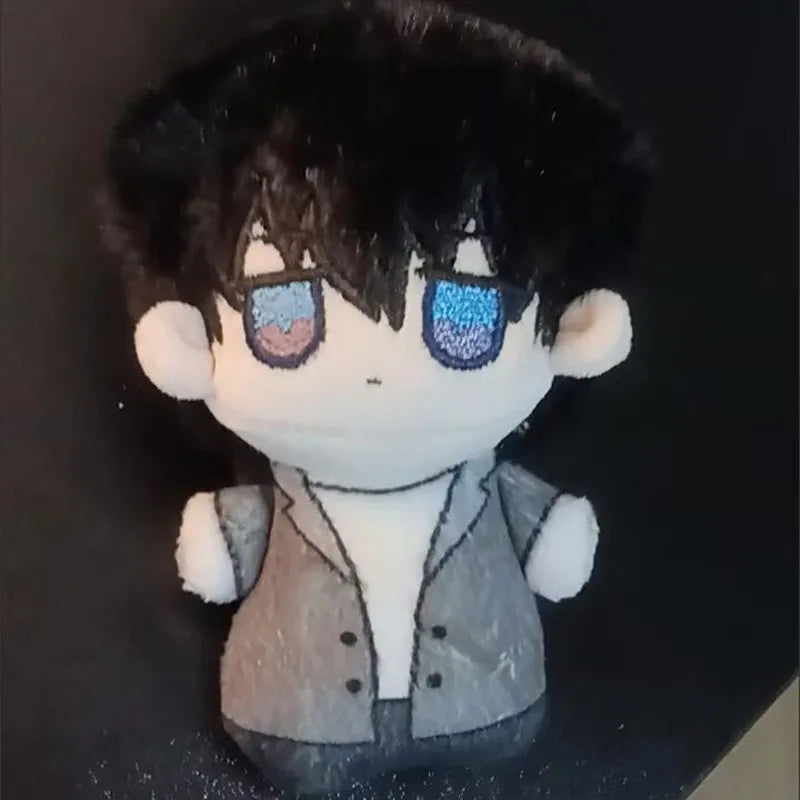 Anime couple plush set displayed together on a shelf as a collectible duo