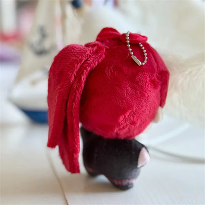 Anime game plush figure Kasumi Yoshizawa holding pendant clasp detail
