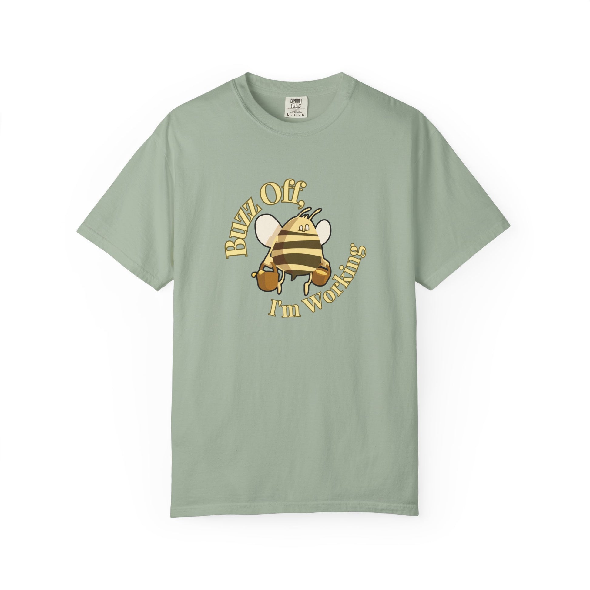 Apiarist humor shirt worn outdoors near wooden beehives in morning light