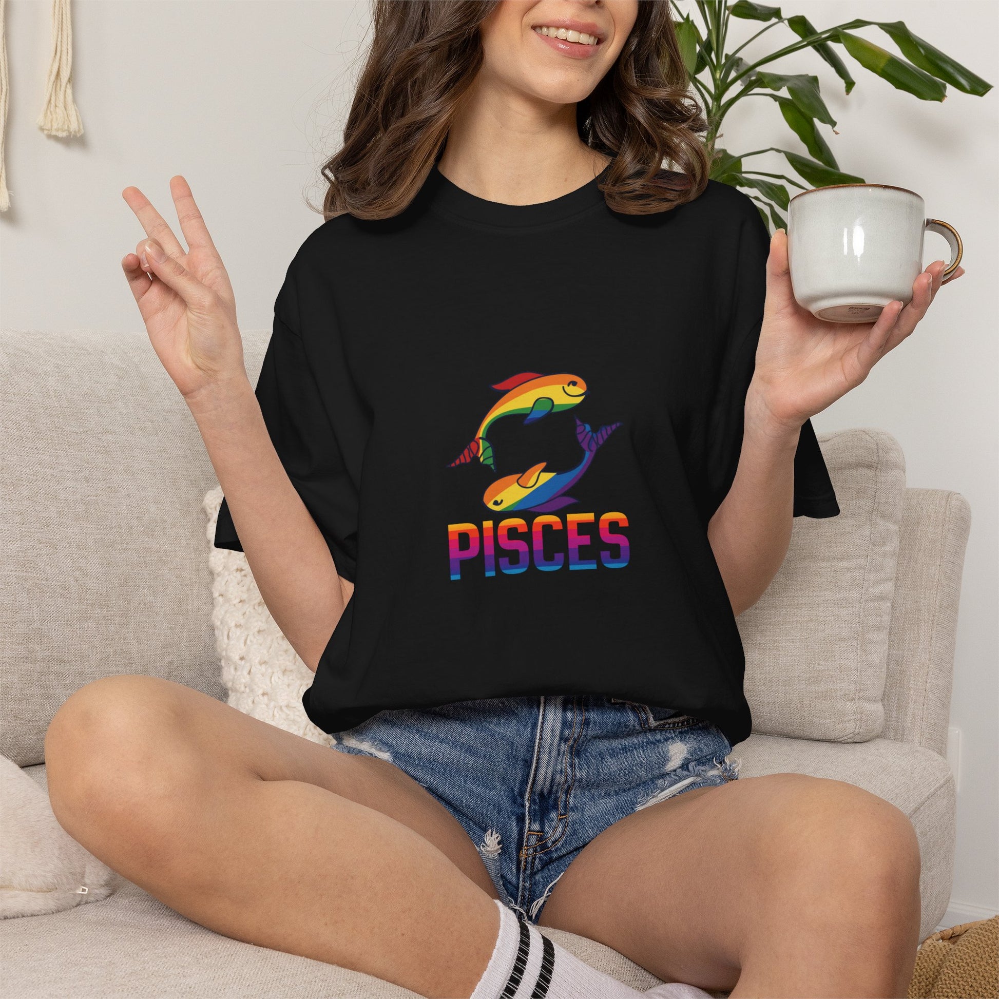 Astrology-inspired graphic tee featuring Pisces fish in warm, soft tones.