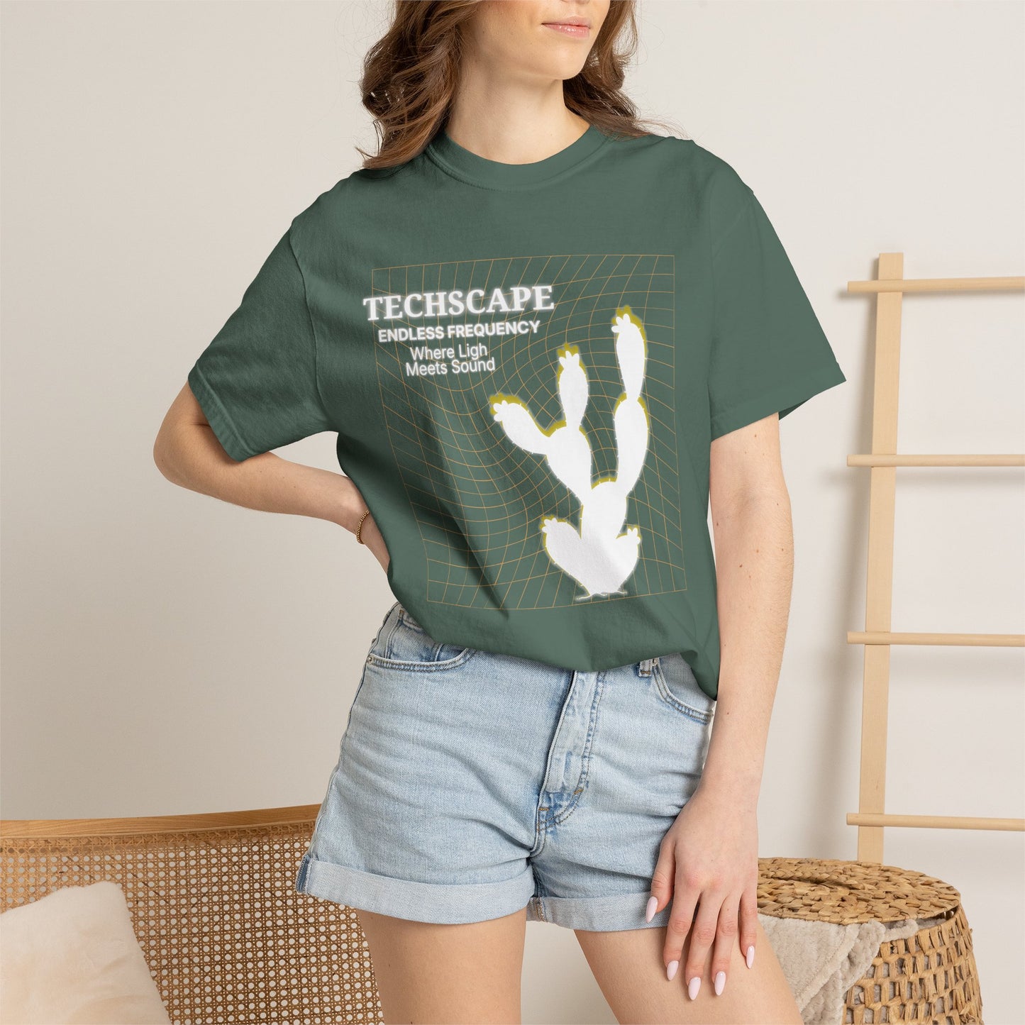 Atmospheric electronic music top with desert silhouette graphic, rear view