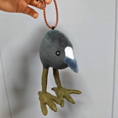 Australasian swamphen plush toy in hand showing scale comparison