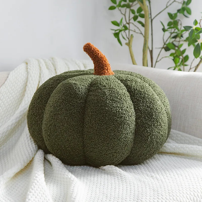 Autumn plush decor velvet pumpkin stuffed animal on a mantelpiece