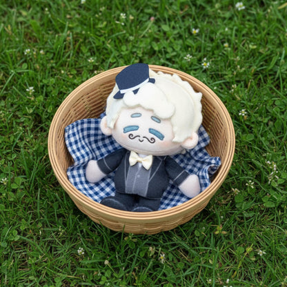 Aziraphale plush pendant hanging from bag charm display
