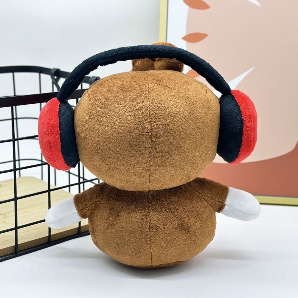 BOMBANANA franchise character plush Deaf Monkey side profile view