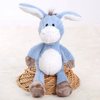 Baby donkey toy gift wrapped with ribbon for a baby shower