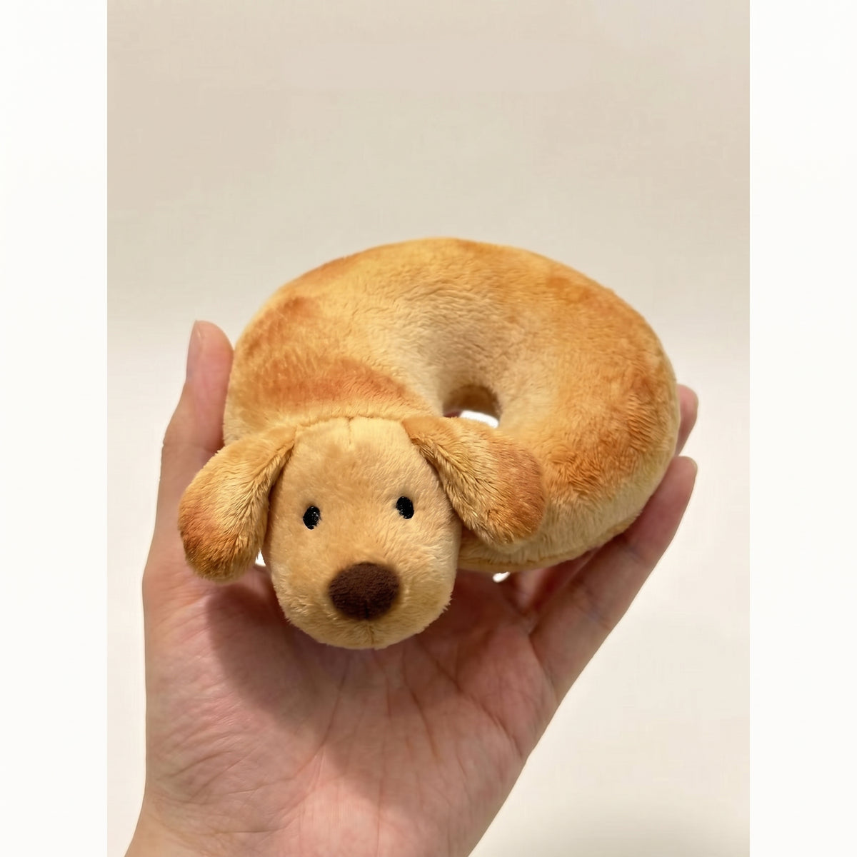 Bagel toy plush pendant golden brown puppy curled asleep