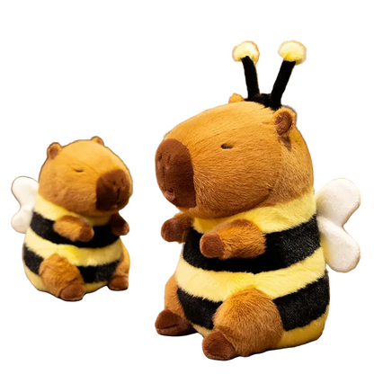 Bee capybara plush toy with bumblebee wings and antennae on white background