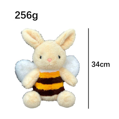 Bee plushie side view showing wing detail and soft fleece texture