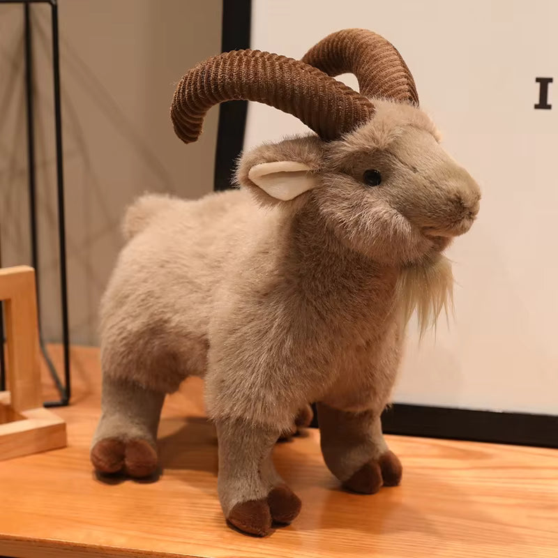 Bighorn sheep stuffed animal side profile showing curling horn detail

