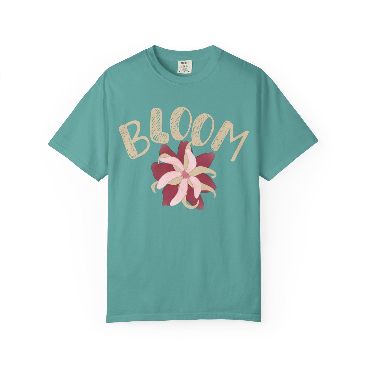 Bloom graphic tee on model, relaxed unisex fit in soft garment-dyed blush pink
