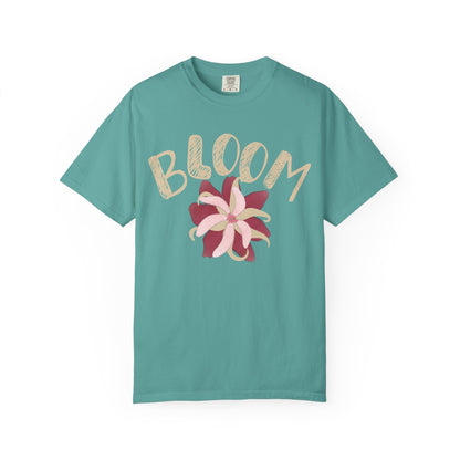 Bloom graphic tee on model, relaxed unisex fit in soft garment-dyed blush pink