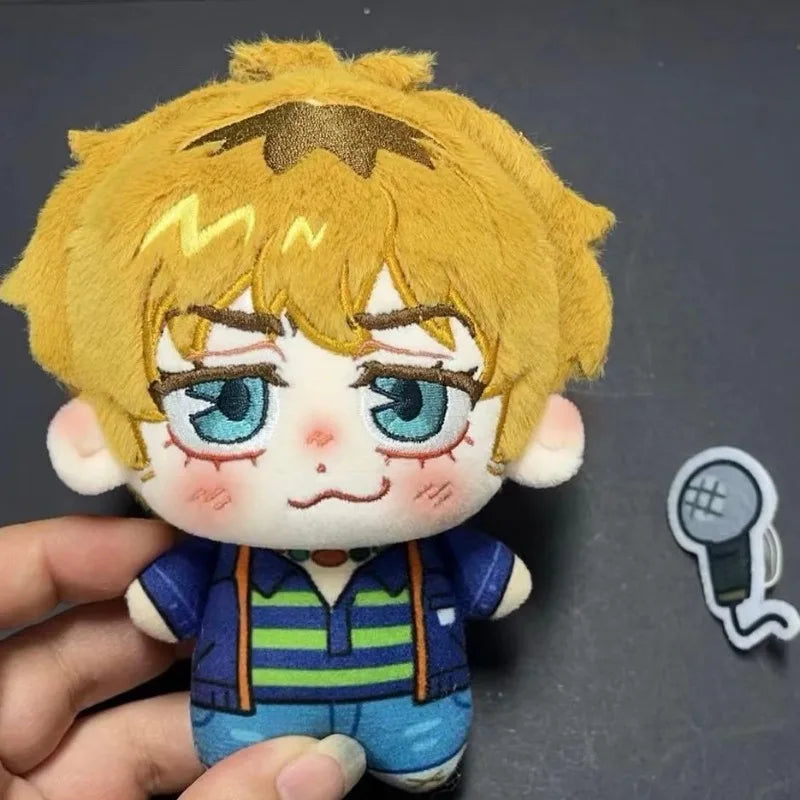 Blur frontman plush keyring clipped onto backpack strap