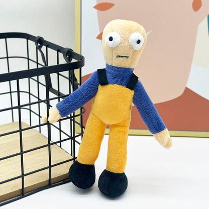 Bob plush toy sitting on gaming desk beside controller for scale