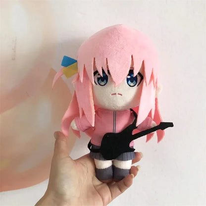 Bocchi plushie holding miniature guitar pink haired collectible