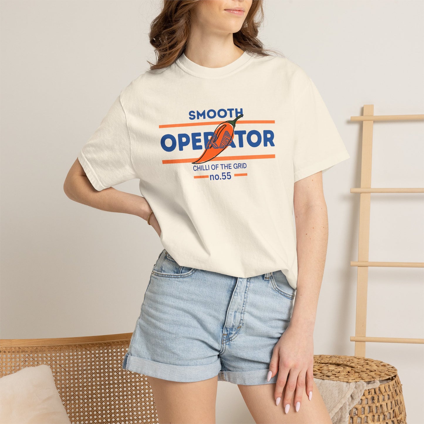 Bold graphic tee for race fans showing a chili pepper paired with Smooth Operator wording