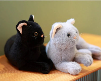 British Shorthair simulation cat plush white variant held in hands for scale