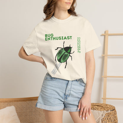 Bug lover tee modeled by female wearer in natural light with foliage background