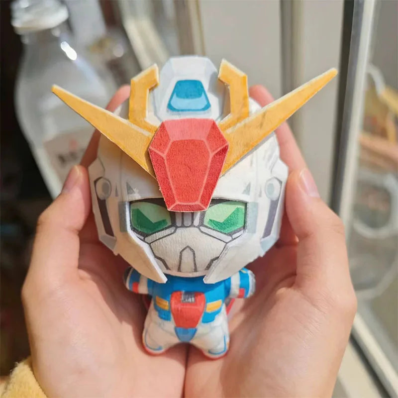 Burning Gundam plush stuffed figure on display shelf

