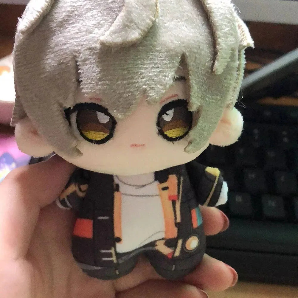Caelus plush displayed on desk beside gaming setup
