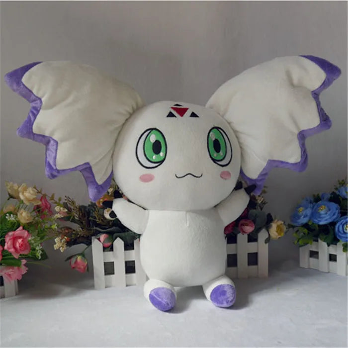 Calumon stuffed animal displayed on shelf anime collectible
