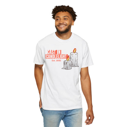 Candlelight printed unisex tee front facing model shot in moody low light setting